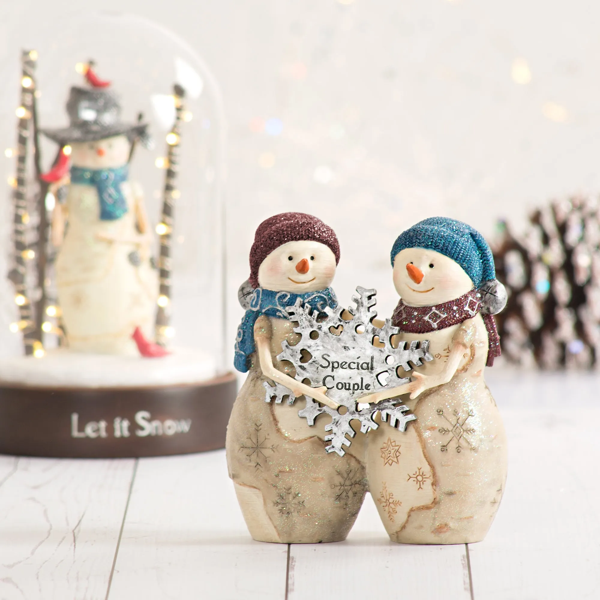 Special Couple 4.5" Snowcouple Holding a Snowflake